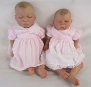 2 Reborn baby dolls 21" heavy weighted doll with closed eyes and painted with a bountiful baby