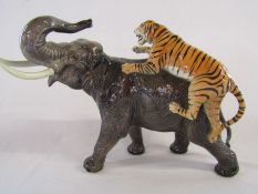 Large Beswick elephant with a tiger on its back Ht 30cm