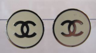 Chanel CC logo cream and silver tone clip on earrings