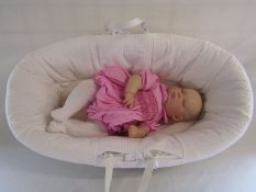 A reborn baby doll 24" very heavy weighted child size sleeping baby with moses basket