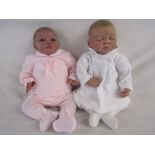 2 Reborn baby dolls 19" heavy weighted doll with dark painted hair and a front body plate and a