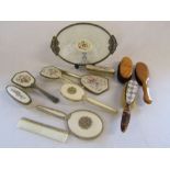 A collection of dressing table sets and clothes brushes to include Regent of London and a mother