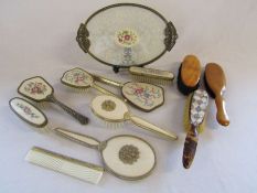 A collection of dressing table sets and clothes brushes to include Regent of London and a mother