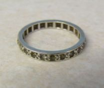 Tested as 9ct gold full eternity ring with spinel stones size N weight 2.1 g