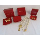 Set of Salvatore Ferragamo gold plated and faux pearl jewellery to include a cuff, necklace and clip