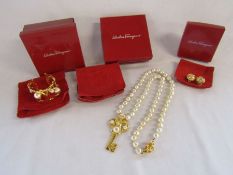 Set of Salvatore Ferragamo gold plated and faux pearl jewellery to include a cuff, necklace and clip