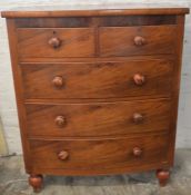 Victorian mahogany bow fronted chest of drawers with turned knobs Ht 125cm L 106cm  D 53cm