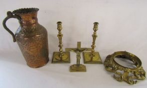 Collection of brass and copper items to include candlesticks, cross, large jug etc