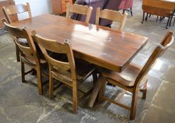 Large oak dining table on X frame legs (180cm by 81cm) with 6 matching dining chairs