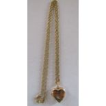 9ct gold locket on a tested as 9ct gold chain total weight approx. 8.1g