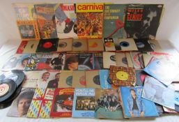Large collection of singles and some 12" vinyl records including Elvis, John Lennon Woman etc