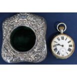 Edwardian silver easel watch case with embossed decoration and indistinct hall mark containing metal