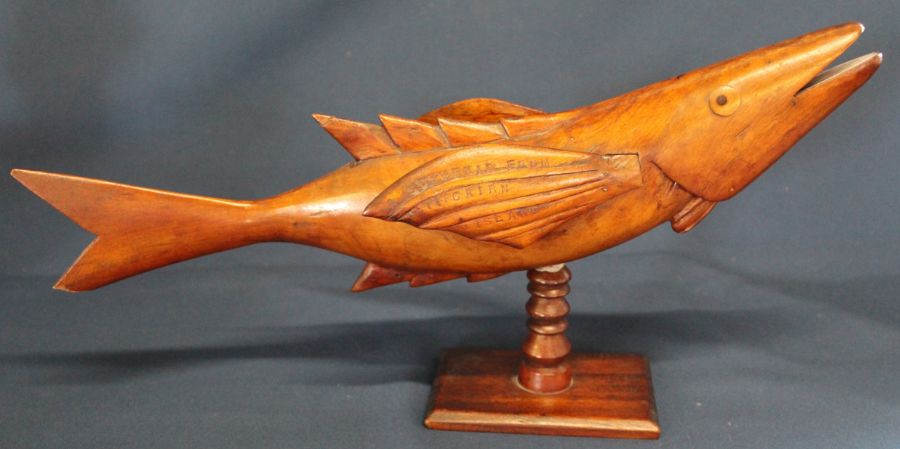Pitcairn Island carved hard wood fish, one fin stamped "Souvenir from Pitcairn Island" (some damage)