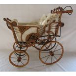 Vintage effect metal and wicker dolls pram