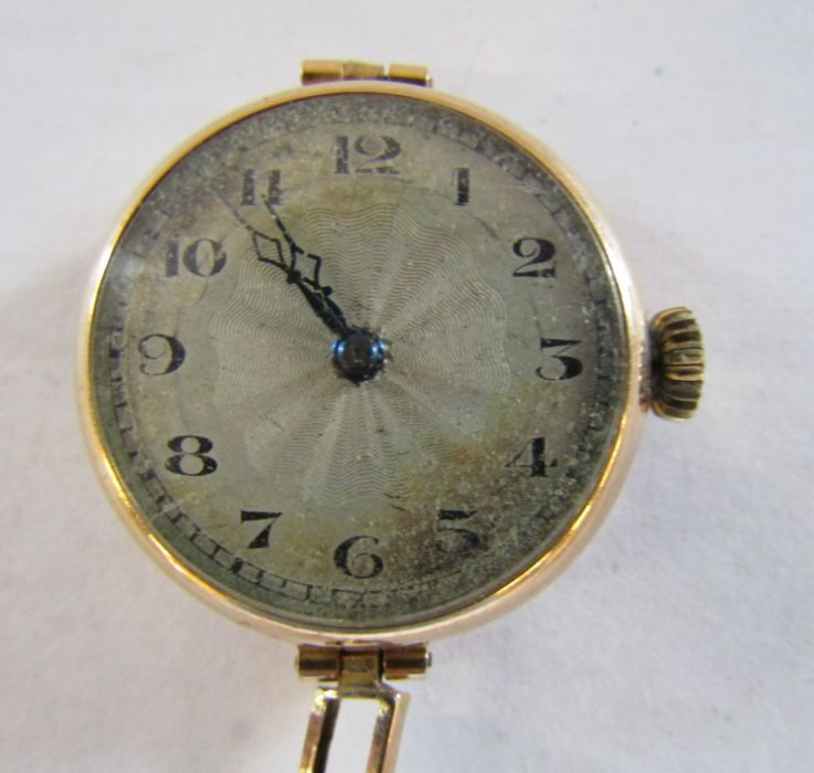 9ct gold ladies watch (broken strap), elastic bracelet also marked 9ct to centre links total