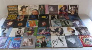 7" vinyl records including Phil Collins, T'pau, Fleetwood Mac, Pandora's box, Bon Jovi, Mental as