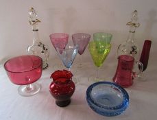 Pair of glass decanters, coloured glasses, cranberry glass and a blue bubble glass dish
