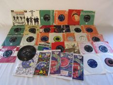 Collection of singles including several by The Beatles