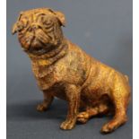 A Reproduction Bergman cast patinated metal model as a seated Pug Dog, cast marks, 8.5cm high