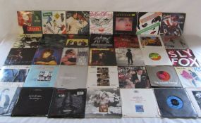 7" vinyl records including Status Quo, Queen, Kate Bush, Rush, Van Halen, Motown, Rolling Stones,