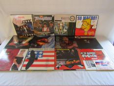 12" vinyl records including Status Quo, Boney M, Adamski, Mai Tai, Sinitta and 7" Grimsby Town