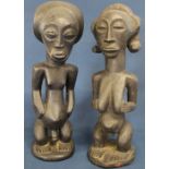 Pair of carved African figures 36cm high