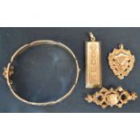 Silver ingot pendant, silver fob, silver & gilt brooch & a silver bangle. Total weight 1.86 ozt