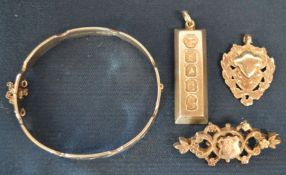 Silver ingot pendant, silver fob, silver & gilt brooch & a silver bangle. Total weight 1.86 ozt