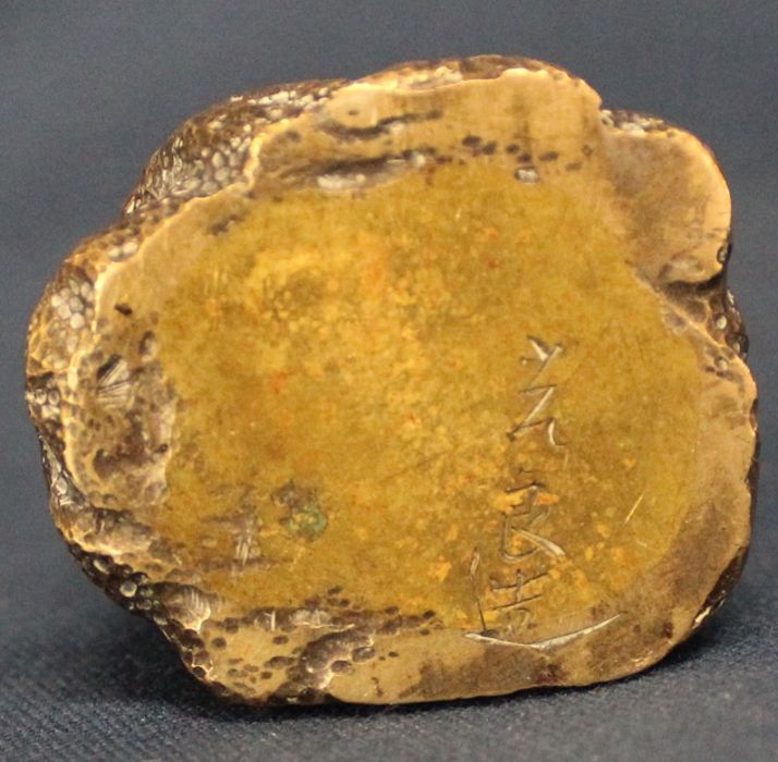 19th century bronze model of Guanyin seated upon rockwork, signed to underside 7.5cm - Image 3 of 4