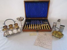 Collection of silverplate including egg cups with carrier, fish knife set given as a wedding gift