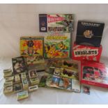 Selection of vintage games including Thunderbirds and a large collection of Brooke Bond collectors