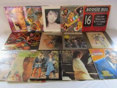 Mixed selection of 12" and 7" vinyl records including Culture club, Boogie Bus, Jason Donovan,