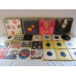 Selection of 7" and 12" vinyl records including the Beatles,  The Kinks, Elton John, Carpenters,