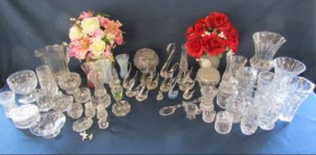 Large collection of glass and crystal items including several glass swans, vases, jars etc