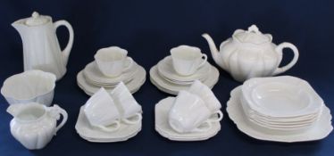 Shelley white glazed dainty shape tea service with embossed decoration and 6 additional dessert