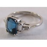 9ct white gold ring with central 1ct London blue topaz and diamond set shoulders total 0.20ct - ring