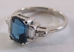 9ct white gold ring with central 1ct London blue topaz and diamond set shoulders total 0.20ct - ring