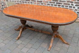 Early 20th century carved mahogany dining table on twin pedestals L190cm by 90cm