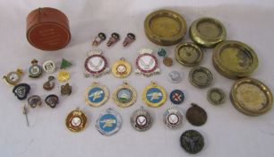 Collection of pin badges and medals from RAF, some Robertsons' Golly pin badges, brass weights etc