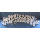 Large collection of glass and crystal drinking glasses