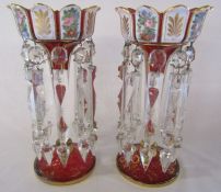 Pair of overlay cranberry lustres approx. 31cm high - gilding is worn in places, some chips to drops