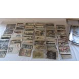 Collection of military themed postcards and sleeves