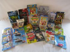 Mixed collection of carded and boxed vehicles including Tugs, Bob the Builder, Tractor Tom, Dr