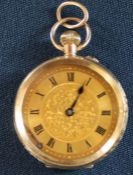 9ct gold open face top wind fob watch with engine turned face & case (hour hand loose) with engraved