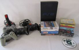 PlayStation ps2 with 2 controllers, 2x PlayStation 1 controllers and games, a selection of SEGA