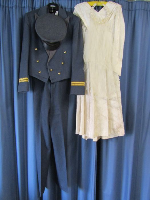 RAF Dinner suit with cap and a wedding gown with veil possibly wax flowers and weighted with faux