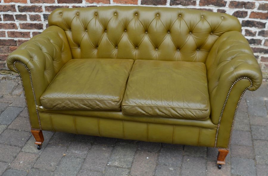 Two seater Chesterfield sofa in olive green leather