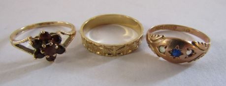 9ct gold band - size R/S - total weight 2.2g and a 9ct gold gypsy ring spinel stones (one stone