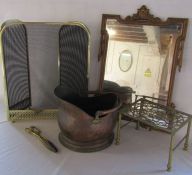 Fire screen, copper coal bucket (damage to base) and tongs, brass trivet and Emessco wall mirror