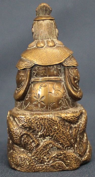19th century bronze model of Guanyin seated upon rockwork, signed to underside 7.5cm - Image 2 of 4
